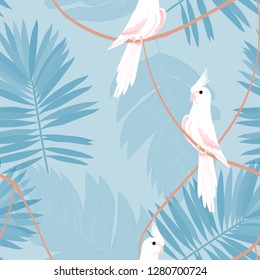 Exotic seamless pattern with a parrot and tropical leaves. Beautiful White Corella on the vine.