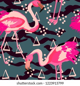 Exotic seamless pattern with pink flamingos. Summer background with birds. Flamingo.