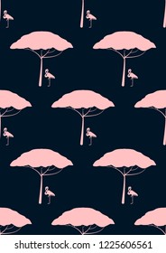 Exotic seamless pattern with pink flamingos and tropical leaves. Summer background with plants and birds.