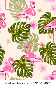 Exotic seamless pattern with pink flamingos,tropical leaves and hibiscus. Summer background with plants and birds.