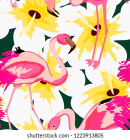 Exotic seamless pattern with pink flamingos,tropical leaves and hibiscus. Summer background with plants and birds. Flamingo.