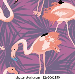 Exotic seamless pattern with pink flamingos,tropical leaves and hibiscus. Summer background with plants and birds.