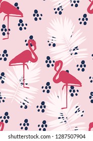 Exotic seamless pattern with pink flamingos,tropical leaves. Summer background with plants and birds.