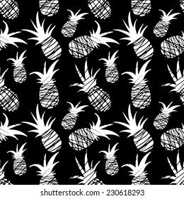 Exotic seamless pattern with silhouettes tropical fruit pineapples in black and white. Food hand drawn repeating background. Abstract print texture. Cloth art design
