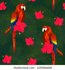 Exotic seamless pattern with tropical flowers and parrots on palm leaf background