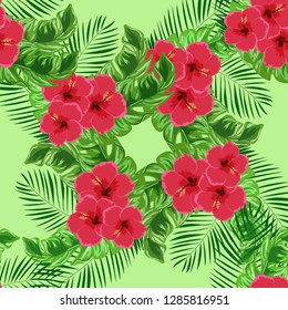 Exotic seamless pattern with tropical flowers and leaves. Banana leaves and hibiscus flower. Floral background with exotic leaves and flowers.