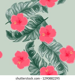 Exotic seamless pattern with tropical flowers and leaves. Banana leaves and hibiscus flower. Floral background with exotic leaves and flowers.