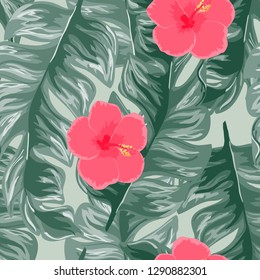 Exotic seamless pattern with tropical flowers and leaves. Banana leaves and hibiscus flower. Floral background with exotic leaves and flowers.