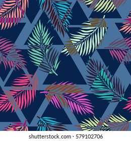 Exotic seamless pattern with tropical leaves on abstract geometric triangular background. Vector fabric, wrapping etc. print.