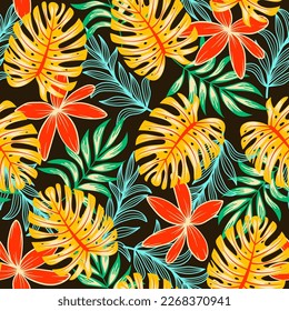 Exotic seamless tropical pattern with bright plants and leaves on a dark background. Tropic leaves in bright colors. Beautiful seamless vector floral pattern. Colorful stylish floral.