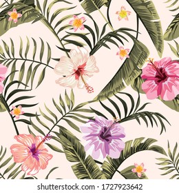 Exotic tropical palm, fern leaves, vivid hibiscus, plumeria flowers seamless pattern on the white background. Jungle vector floral wallpaper.