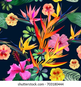 Exotic tropical strelitzia flowers on a dark background.Creative tropical seamless pattern