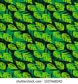 Exotic tropical vector seamless pattern. Leaves of palm trees, monstera, leaves in the jungle. Hand drawn. For design, wrapping paper, fabric, textile, carpets, clothes, wallpaper, trendy background.