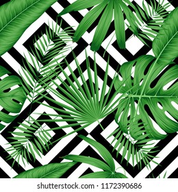 Exotic vector seamless pattern with tropical leaves on a geometric background