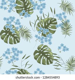 Exotic wild floral print. Tropical vector seamless flower and  wild flora. Blooming wild print, seamless floral pattern. For wallpaper, backgrounds, textile, fabric printing. Vector illustration.