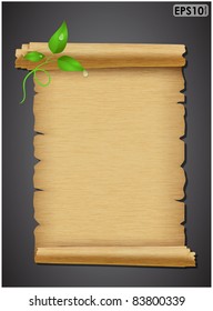 Expand torn sheet of parchment with a rough texture and green sprout on a dark background