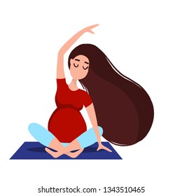 Expecting mother exercising on Pilates mat