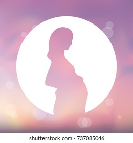 Expecting (pregnant) mother. Pink silhouette in a white circle. Design element for pregnancy theme. Blurred pink background