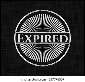 Expired chalkboard emblem on black board