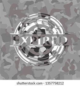 Expired written on a grey camouflage texture