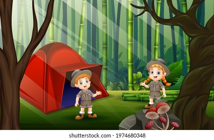 The explorer boy and girl camping in the bamboo forest