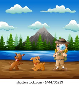 The explorer boy with his pets in the nature