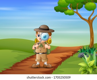 The explorer boy with magnifying glass on the road