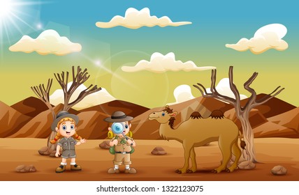 The explorer kids with a camel in the desert