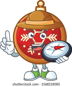 Explorer red christmas ball cartoon character holding a compass.