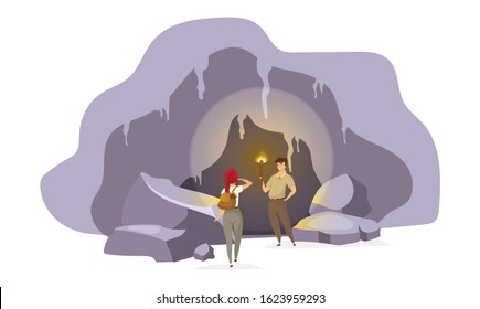 Explorers in cave flat vector illustration. Expedition group inside old mountain. Man standing with torch. Woman observing tunnel. Journey to ancient cavern. Tourists cartoon characters