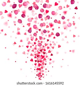 explosion of confetti from red hearts and rose petals on a white background