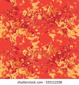 Expressive seamless pattern from paint splashes of red and orange. For fabric, background, screensaver.