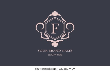 Exquisite baroque pattern. Floral ornament with initial letter F. Vintage frame, greeting card, wedding invitation. Vector logo template, label, business sign.