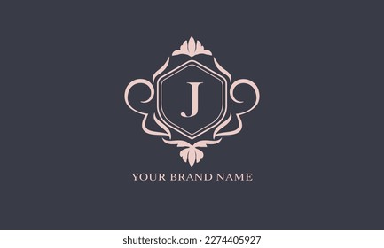 Exquisite baroque pattern. Floral ornament with initial letter J. Vintage frame, greeting card, wedding invitation. Vector logo template, label, business sign.