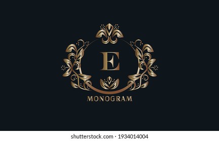 Exquisite bronze monogram on a dark background with the letter E. Stylish logo is identical for a restaurant, hotel, heraldry, jewelry, labels, invitations.