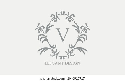 Exquisite design of an elegant monogram with the letter V in the center in gray. Logo for boutiques, cafes, bars, restaurants, invitations. Business style and brand of the company