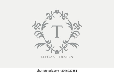 Exquisite design of an elegant monogram with the letter T in the center in gray. Logo for boutiques, cafes, bars, restaurants, invitations. Business style and brand of the company
