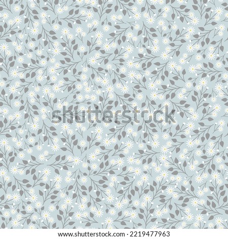 Exquisite ditsy floral seamless surface pattern design. Aesthetic bunch of blooming wildflowers and leaves. Allover printed textured background. Dainty tileable multicolour floral arrangement   Stockfoto © 