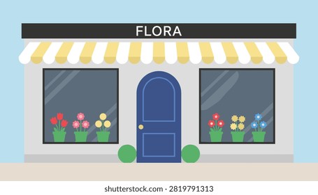 Exterior view of a small flower shop named Flora with a blue door, striped yellow awning, and windows filled with potted flowers.