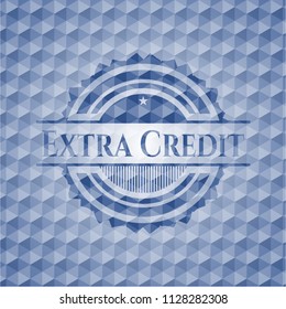 Extra Credit blue badge with geometric pattern.