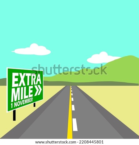 An "Extra Mile" sign on the side of the road with a view of the mountains in a cloudy blue sky to celebrate Extra Mile Day on November 1
