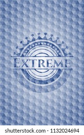 Extreme blue emblem with geometric pattern.