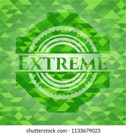 Extreme green emblem with triangle mosaic background