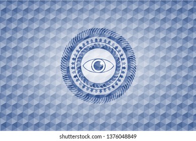 eye icon inside blue badge with geometric pattern.