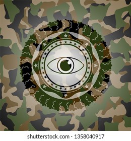 eye icon inside camouflage emblem