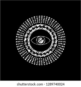 eye icon inside chalk emblem written on a blackboard