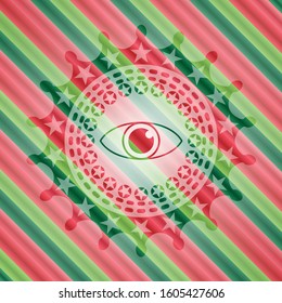 eye icon inside christmas badge.