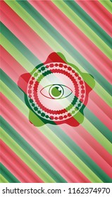 eye icon inside christmas emblem.