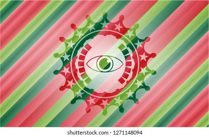 eye icon inside christmas style emblem.