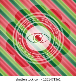 eye icon inside christmas style badge..